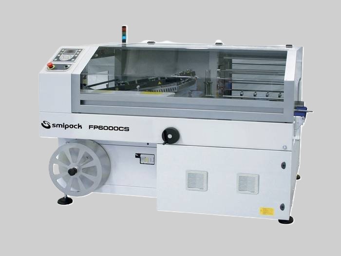 Įrenginiai pakuojantys į termo susitraukiančią plėvelę smipack